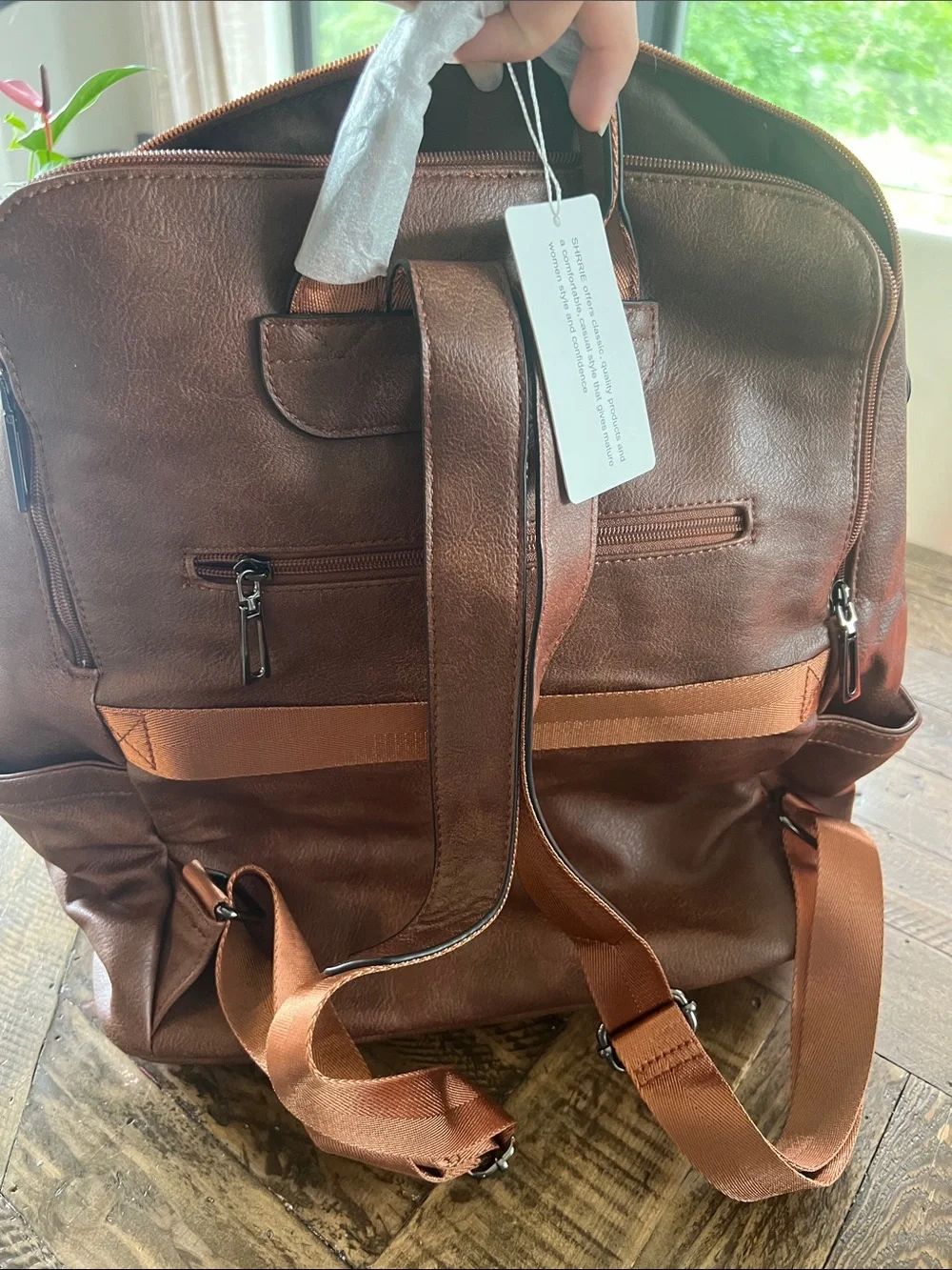 Amazon Brown Faux Leather Backpack with Tassel Accent